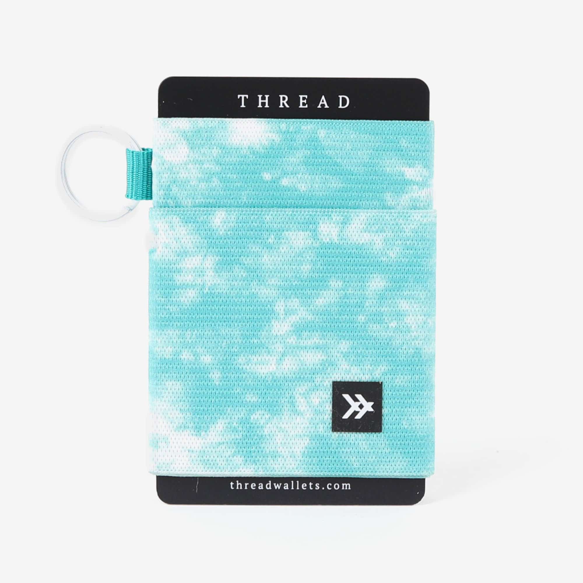 This is an image of Backpacks and Bags Bags and Backpacks THREAD ELASTIC WALLET