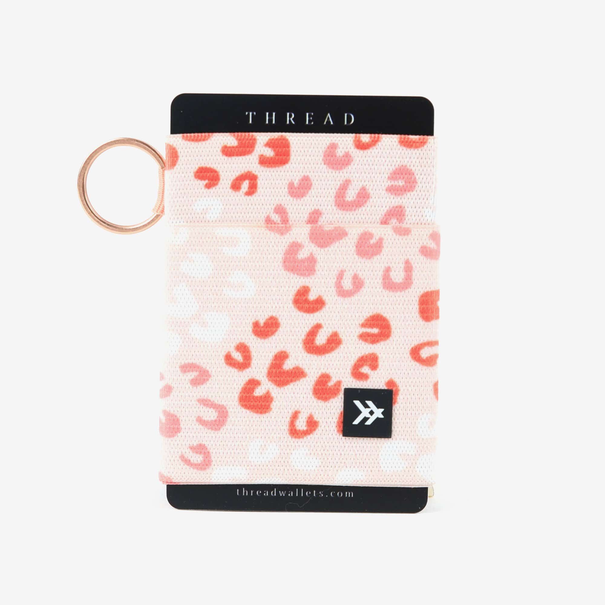 This is an image of Backpacks and Bags Bags and Backpacks THREAD ELASTIC WALLET