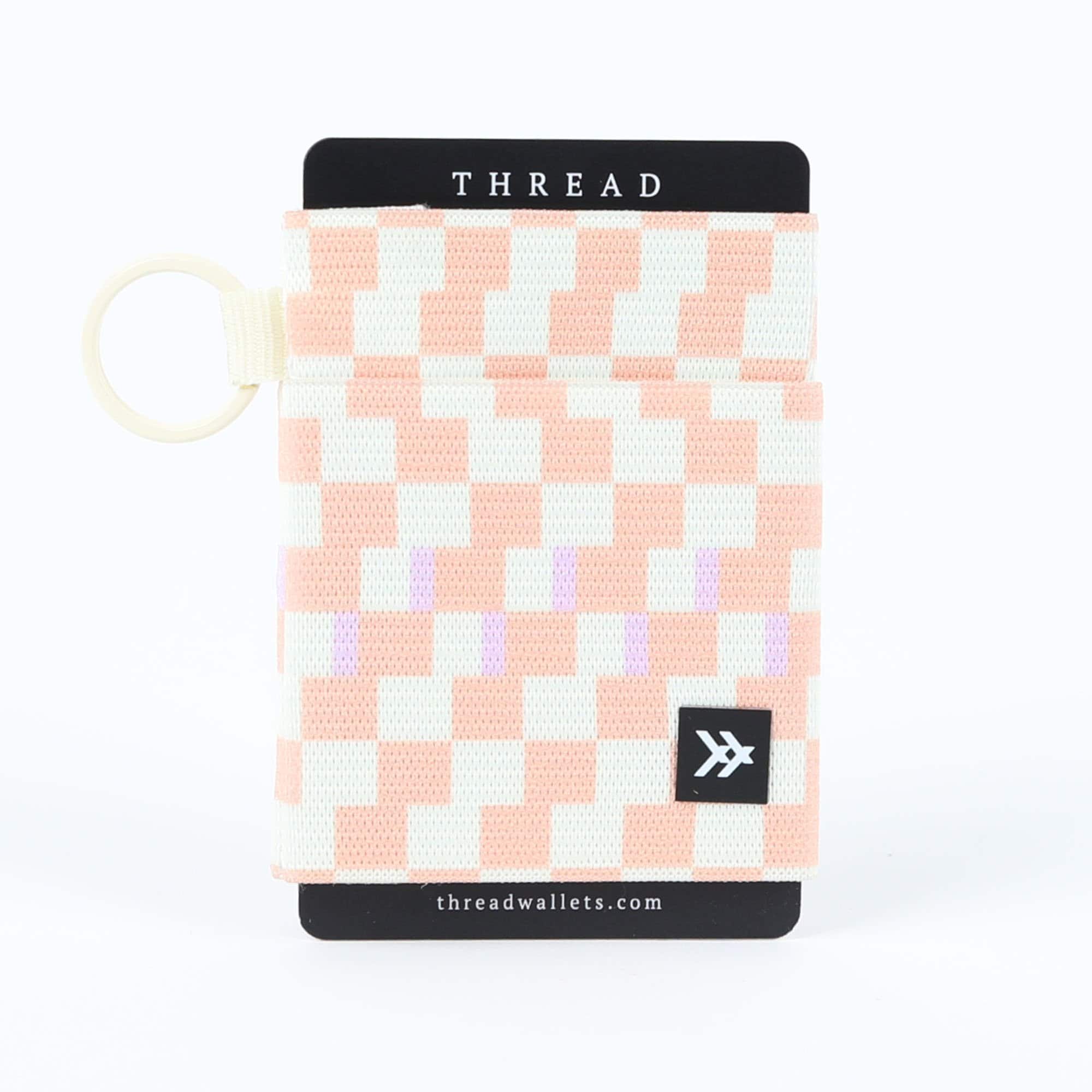 This is an image of Backpacks and Bags Bags and Backpacks THREAD ELASTIC WALLET